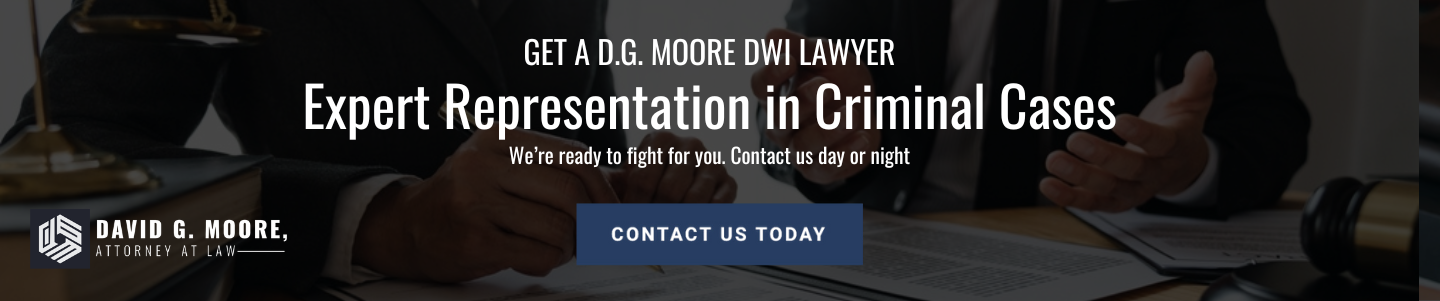 A defense attorney discussing felonious assault charges with a client in a Michigan law office.